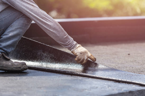 Professional Waterproofing technician working in Bayport, NY